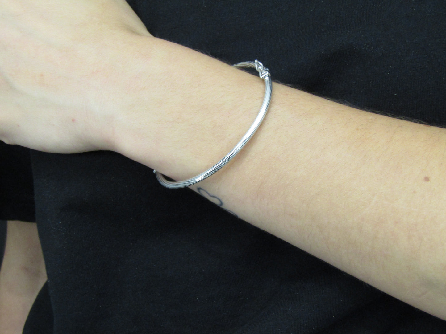 Bracelet torsadé en argent 925 rhodié – Brillance sculptée et élégance intemporelle
