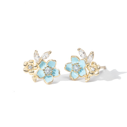 Boucles d’oreilles fleur bleu ciel en argent 925 rhodié doré – Éclat zirconium