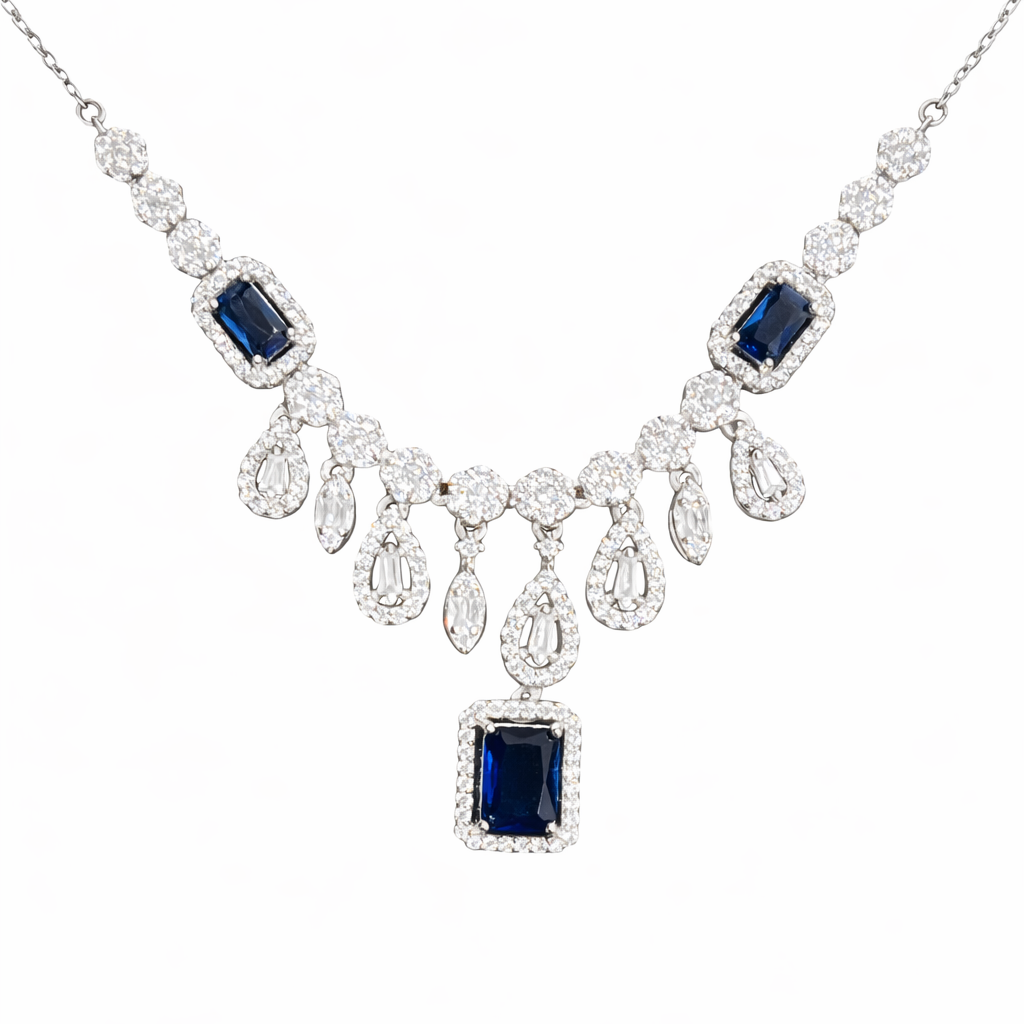 Boucles d’oreilles clous en argent 925 rhodié avec pierre bleue et zircons blancs. Bijou femme chic et élégant.